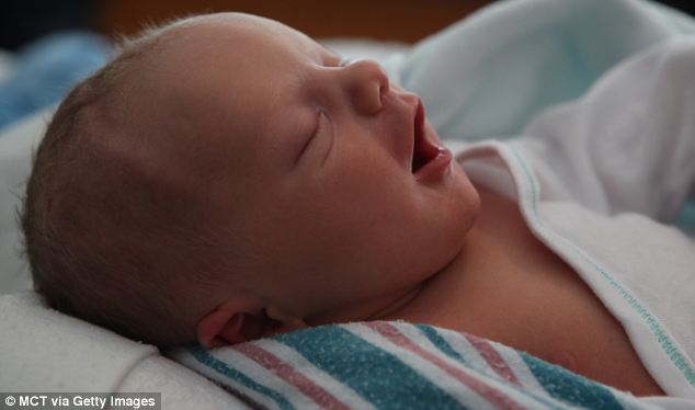 Lucky little boy: Finnean Connell pictured at Prentice Women's Hospital in Chicago, the day of his birth