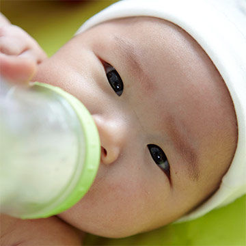 baby drinking bottle