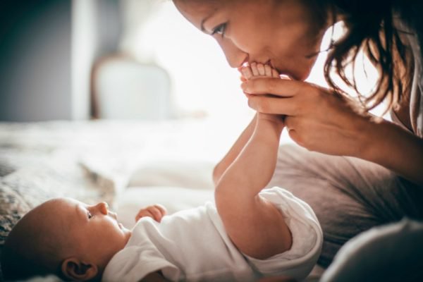 happy mum with baby