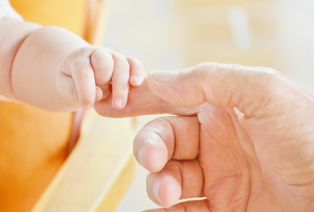 Parents Ask: What Do Baby Hand Movements Mean?