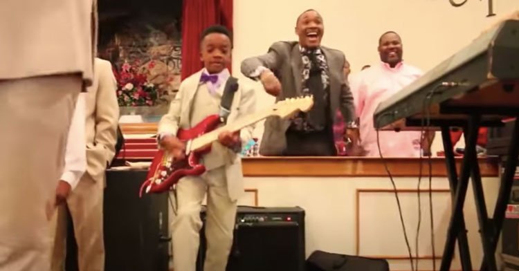 Dad Has Adorable Freak-Out When He Sees Son Performing Epic Guitar Solo.