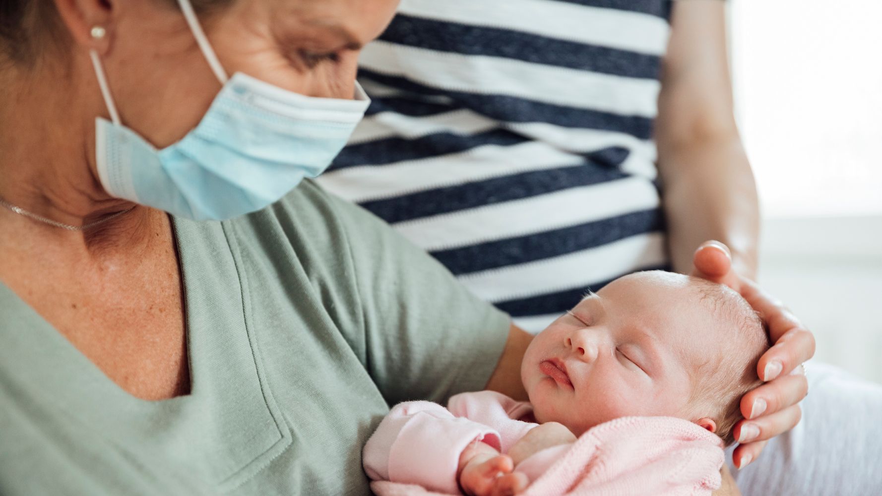 Should You Get The COVID-19 Vaccine Before Meeting A Newborn?