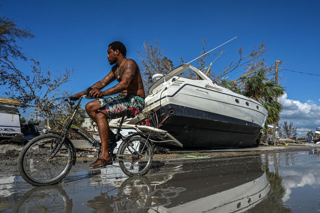 Mom Uses Plastic Bin to Protect Baby Boy as Hurricane Ian Destroys Neighborhood in Florida