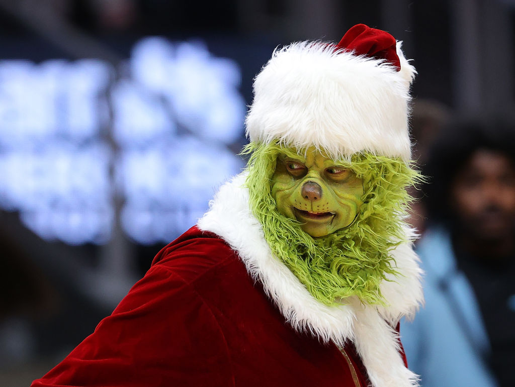 Controversial Holiday Trend: Children Traumatized by Parents Dressing up as Grinch and Stealing Their Gifts