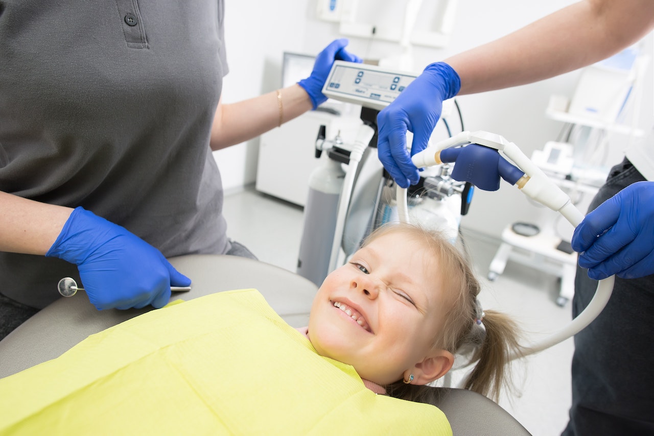 70-Year-Old Dentist Hygienist Wears Funny Costumes to Work to Make Kids and Adults Unafraid