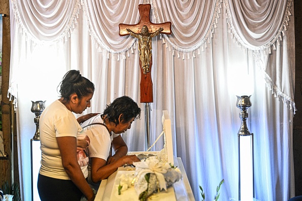 Ecuadorian Woman Declared Deceased Sends Shockwaves as She Vigorously Thumps on Her Coffin During Wake