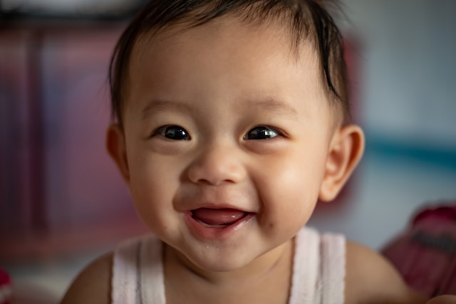 When Baby's First Tooth Cuts Through: Understanding Teething Tales