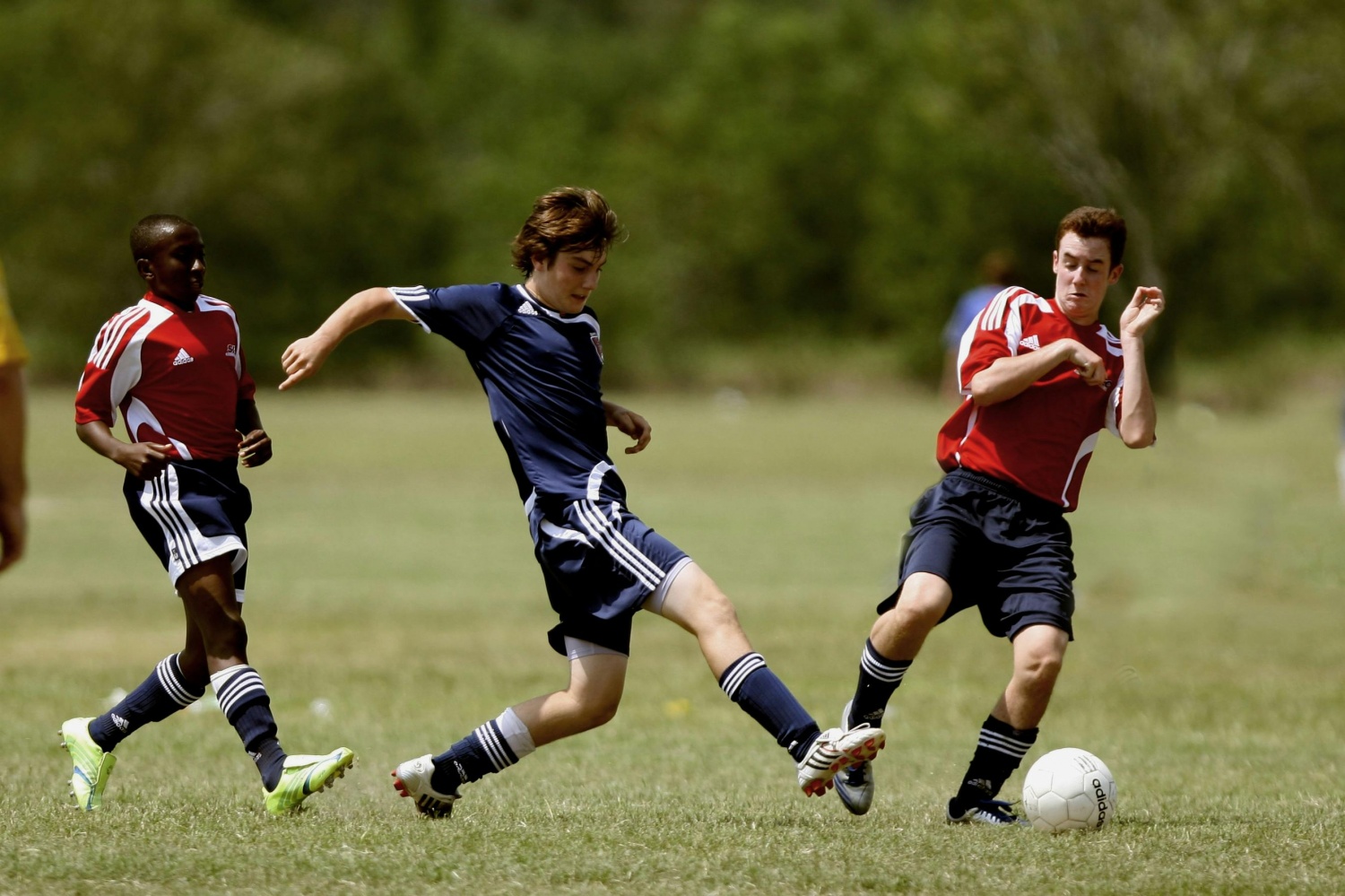 boys kick ball