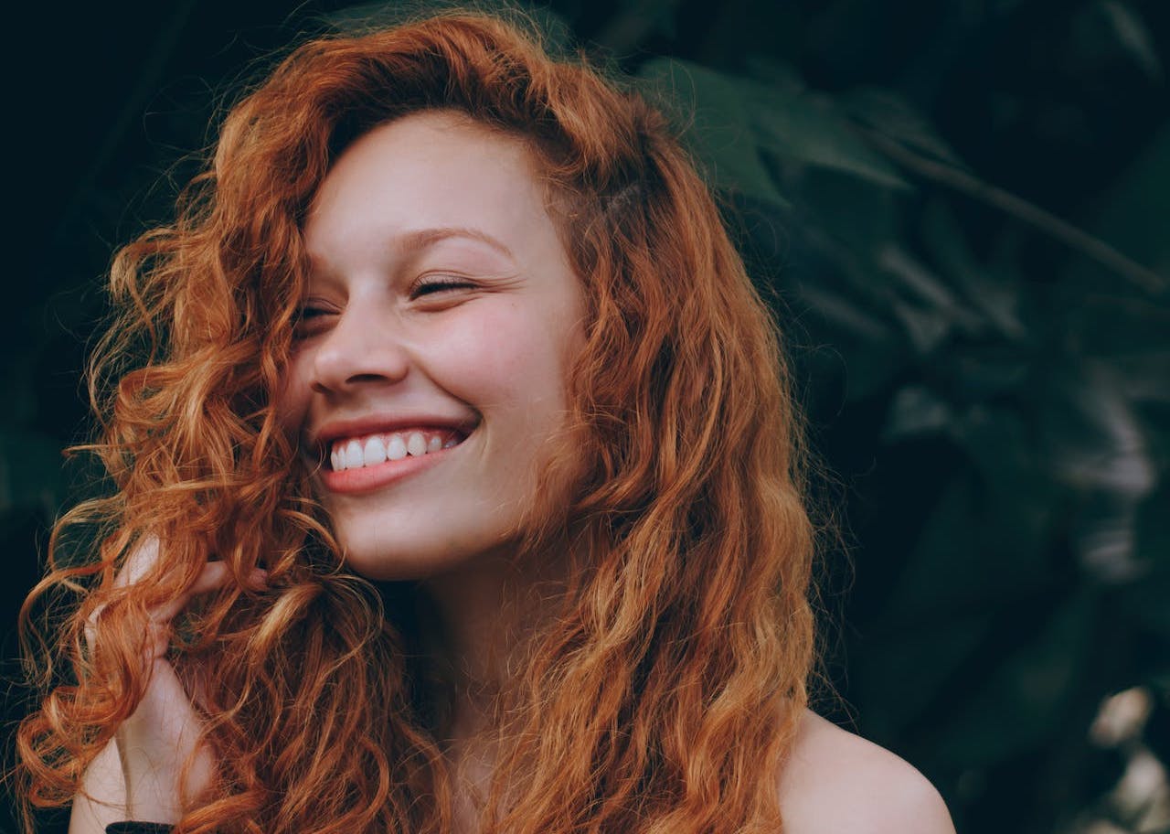 red hair with big smile