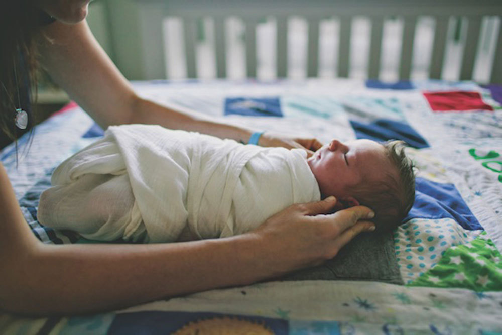 How to Swaddle a Baby Safely and Effectively - Pregnancy & Newborn Magazine