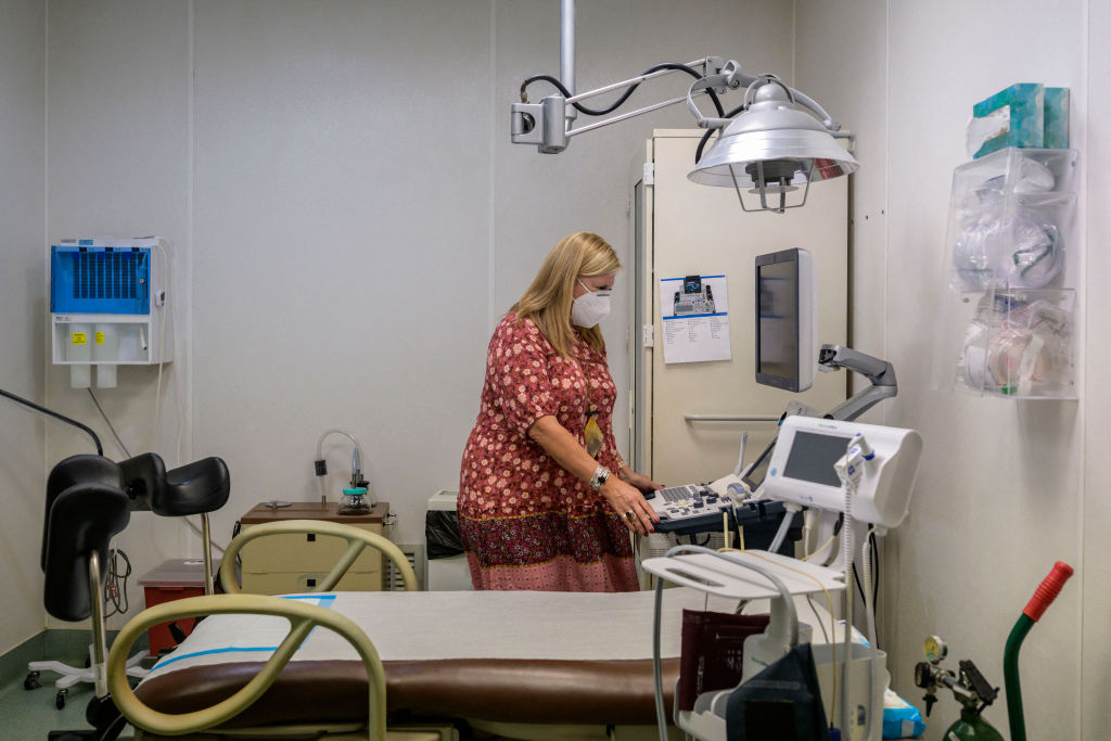 Navigating State Abortion Laws With Early Ultrasounds, Genetic Screenings