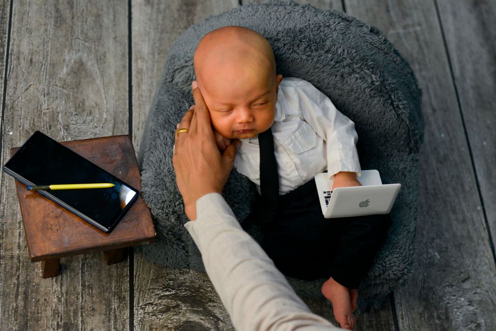 Newborn Photo Shoot Goes Viral After Photographer Shares Photos of Baby's Grumpy Expression Online